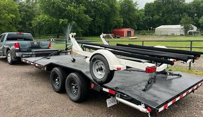 Transporting equipment securely using trailers