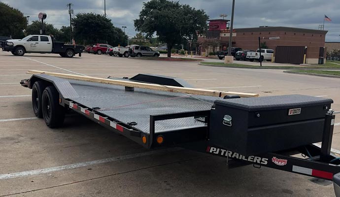 Pj trailers flatbed equipment hauler